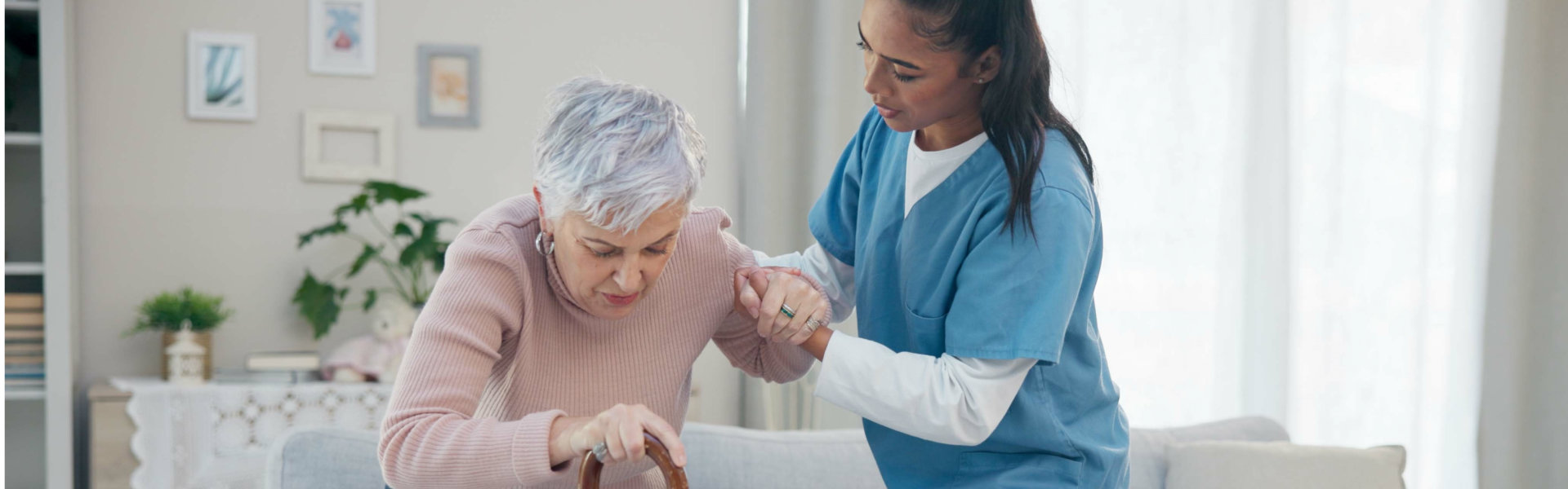 Caregiver support, elderly woman with walking stick